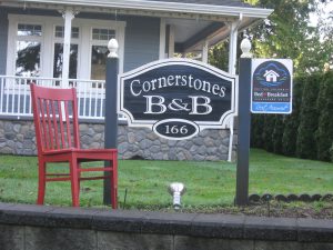 Red at Cornerstones sign